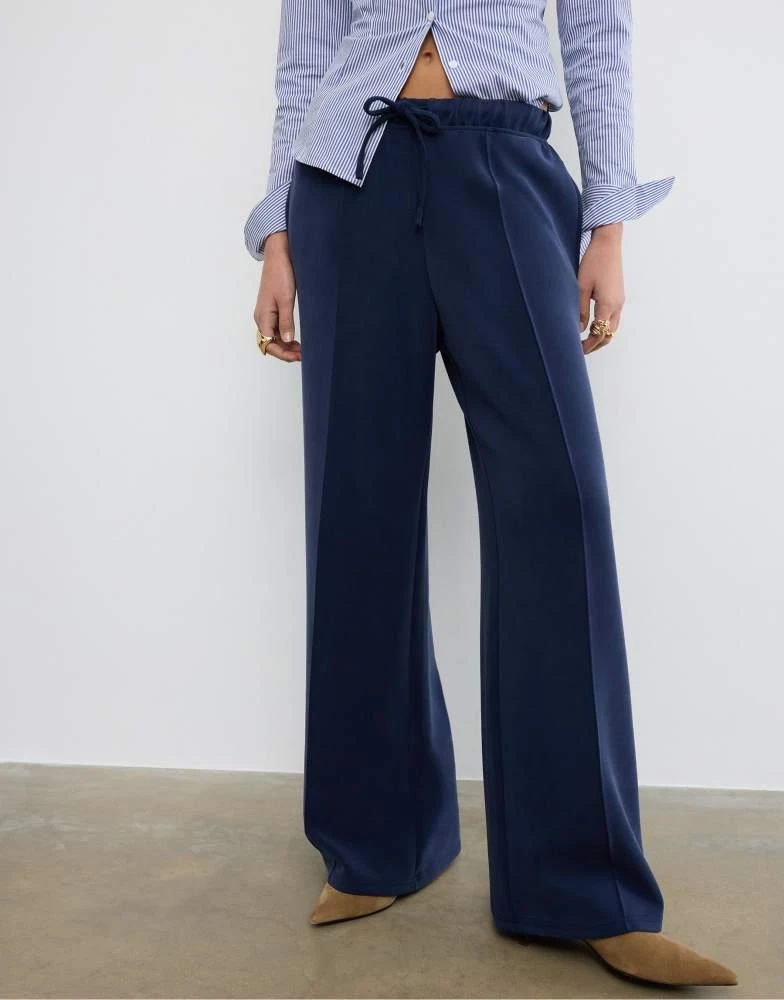 Stradivarius Stradivarius Soft-touch wide-leg jogger trousers with front seam detail in navy blue 2