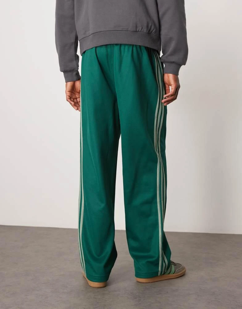 Adidas adidas Originals Firebird Loose track pants in green 3