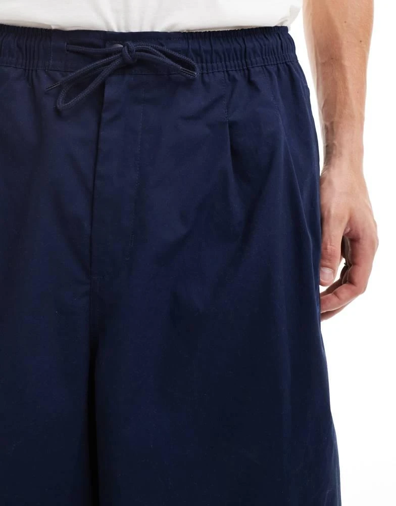 NIKE Nike Club woven balloon oversized trousers in navy 5