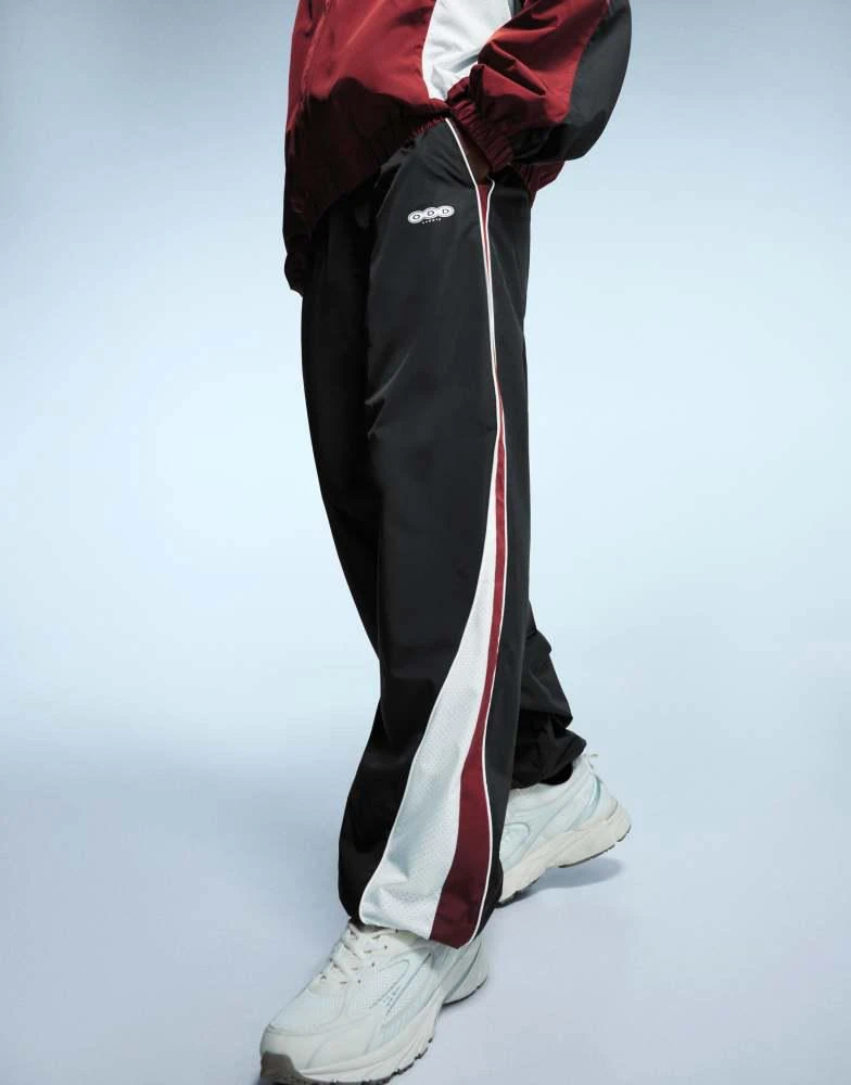 Bershka Bershka Super baggy technical sports trousers in black