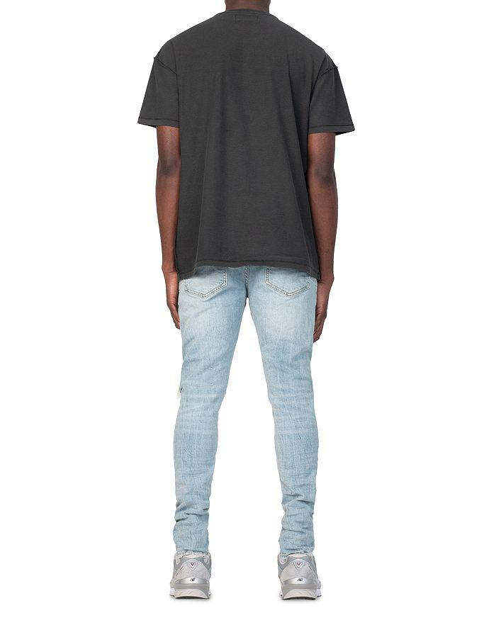 Purple Brand Dropped Slim Fit Destroyed Jeans in Light Indigo