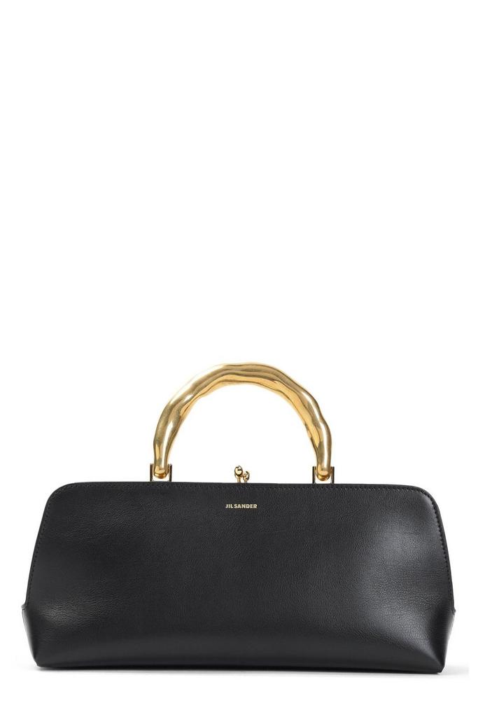 Jil Sander Black shearling clutch - Handbags - Compare