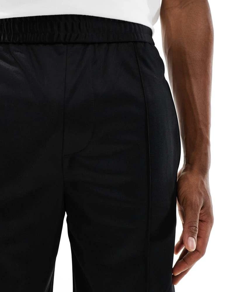 Bershka Bershka wide fit side panel joggers in black 2