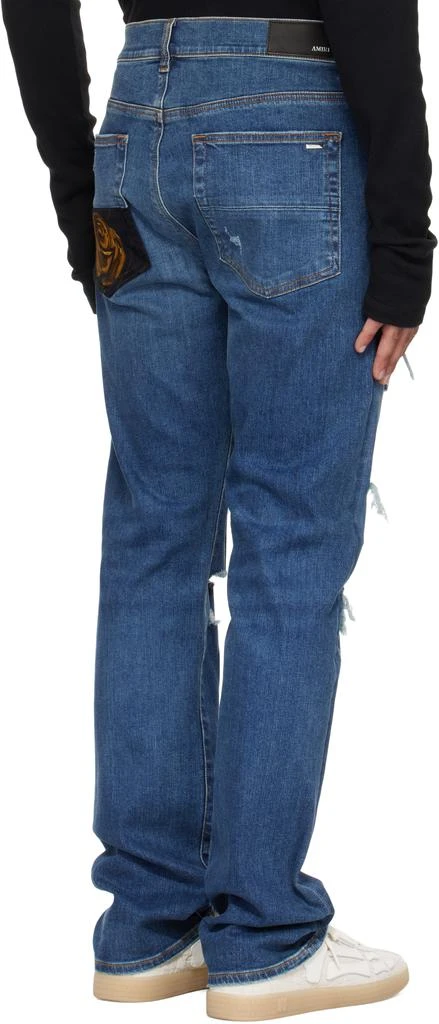 AMIRI Blue Floral Velvet Slim Thrasher Jeans 3