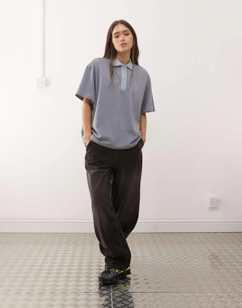 Monki Monki boxy fit short sleeve polo shirt in blue stripe 2