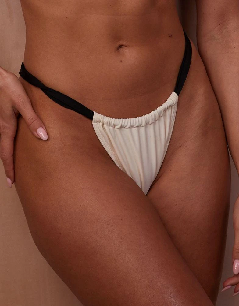 Wolf & Whistle Wolf & Whistle X Emily Hughes Fuller Bust ruched side contrast bikini bottom in cream and black 2