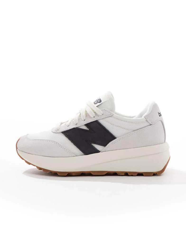 New Balance New Balance 370 trainers in off-white and black 2