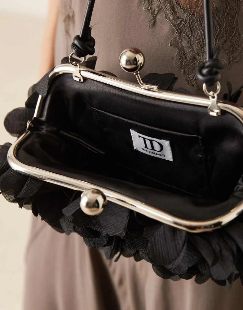 True Decadence True Decadence 3D floral clutch bag in black 3