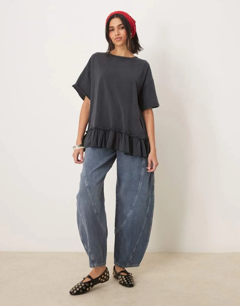 Free People Free People ruffle edge oversized t-shirt tunic in washed black 1