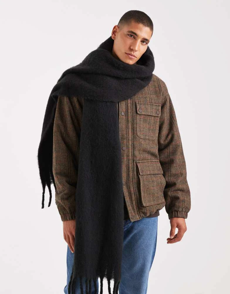 Shop ASOS DESIGN woven brushed scarf in black on Sale at