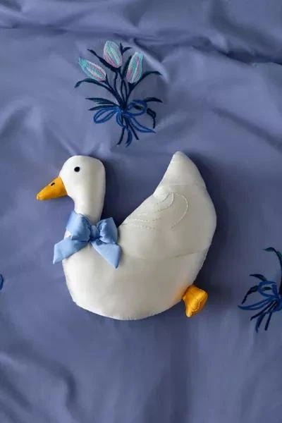 Urban Outfitters Goose Shaped Satin Throw Pillow 1