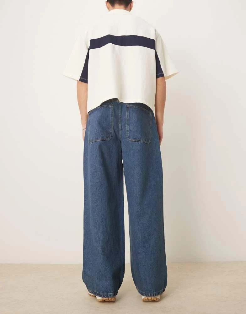 ASOS ASOS DESIGN super baggy jeans with twisted seams in mid wash blue 2