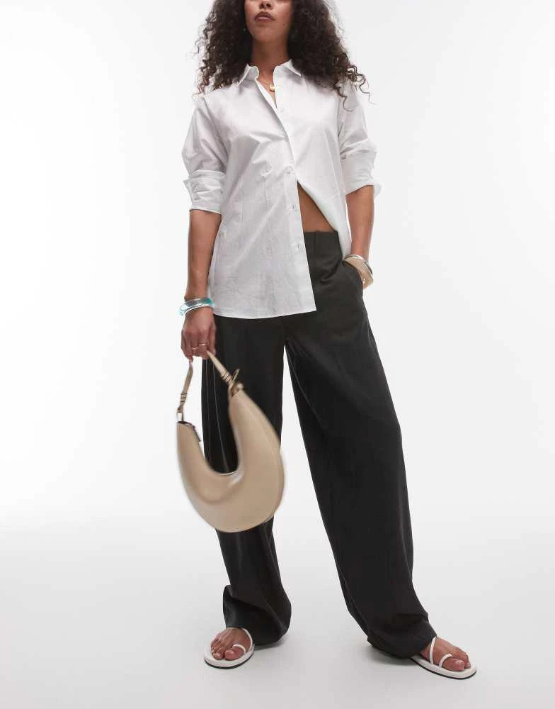 Shop Topshop mid rise balloon leg clean waistband tapered trouser