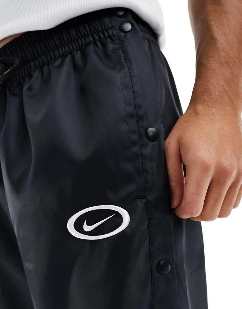 NIKE Nike Basketball DNA woven  tearaway joggers in black 2