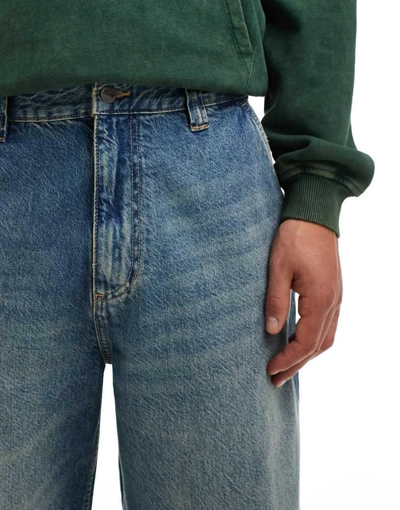 Pull&Bear Pull&Bear skater fit jean in blue with yellow cast 5