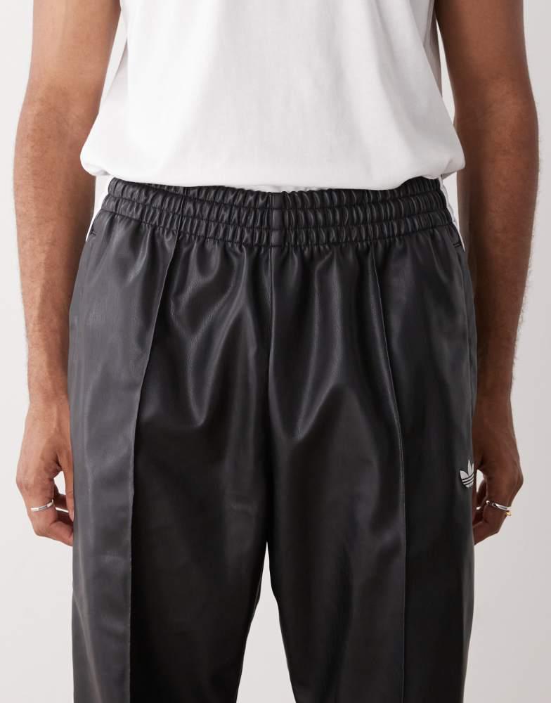adidas Originals Adidas x jeremy scott faux leather wide pants in
