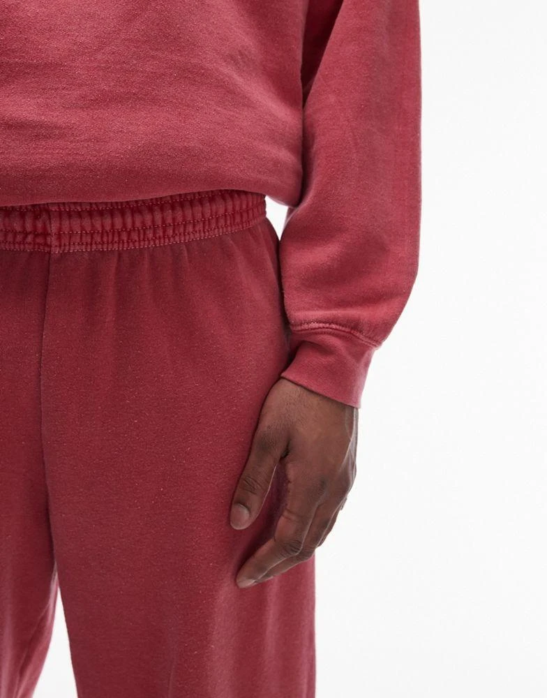 Topman Topman vintage wash oversized jogger in red 3