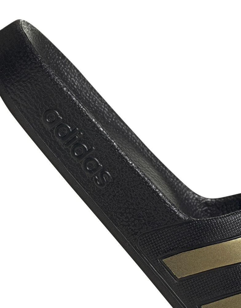 Adidas adidas Training Adilette sliders in black and gold 4