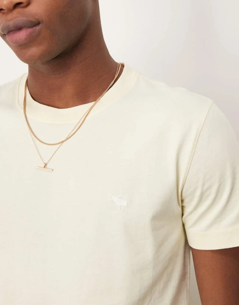 Abercrombie & Fitch Abercombie & Fitch puffy moose icon logo crew neck t-shirt in yellow 3
