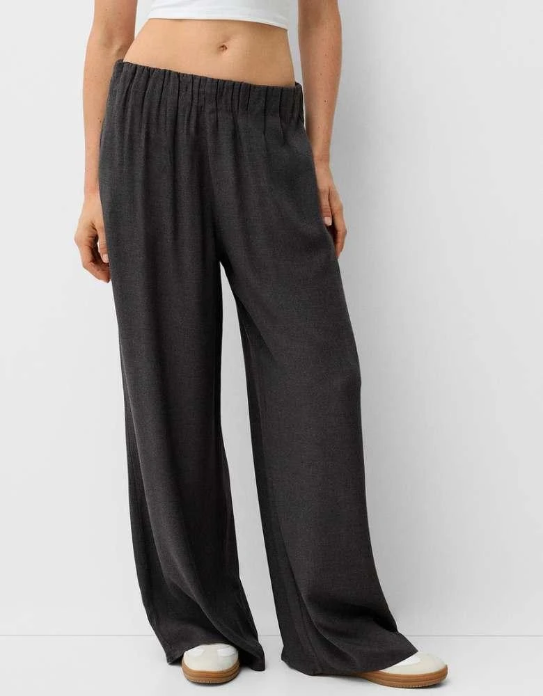 Bershka Bershka Petite drawstring waist wide leg trousers in dark grey check 2
