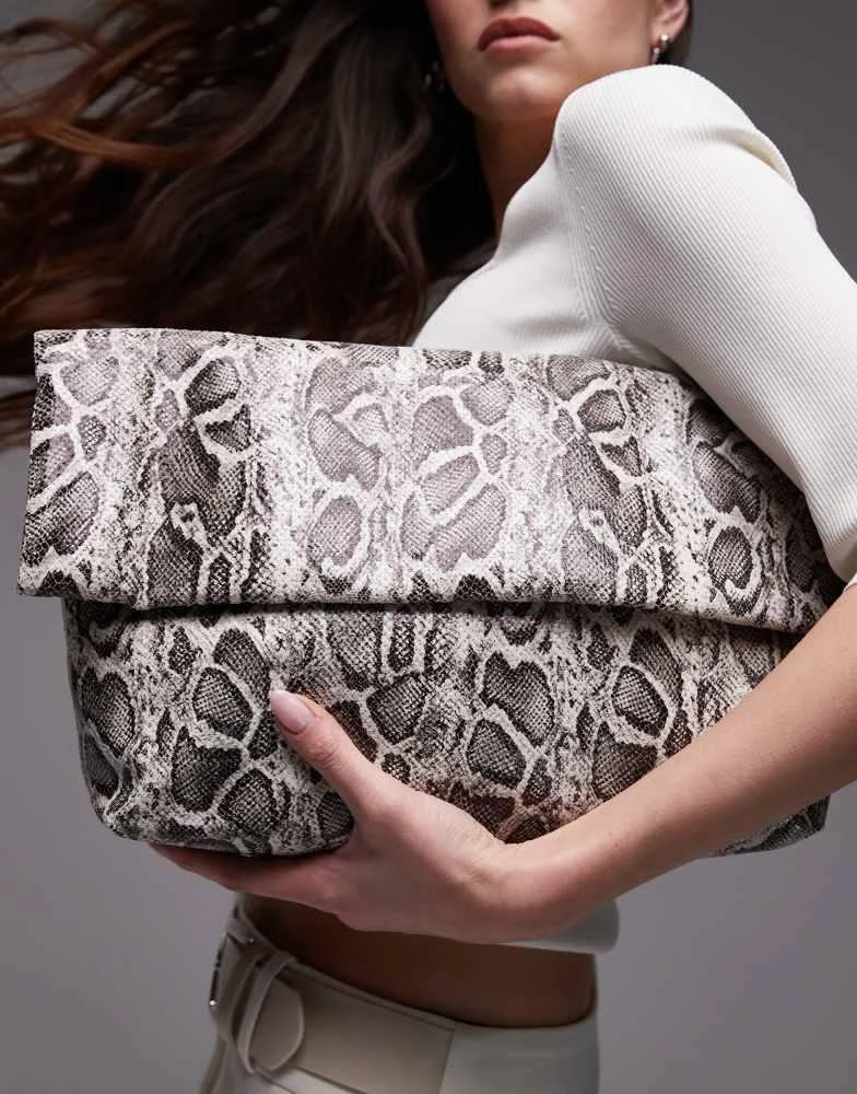 Topshop Georgia folded clutch grab bag in snake print – On Sale
