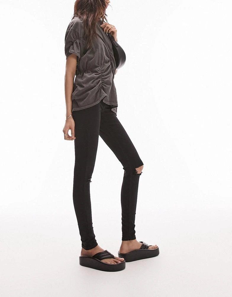 Topshop Topshop high rise Jamie jeans with knee rip in black 5