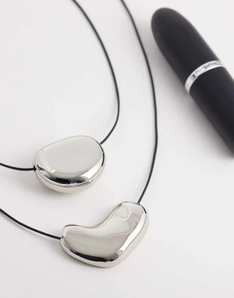 ASOS ASOS DESIGN multi-row pendant necklaces with metal detailing in silver tone 2