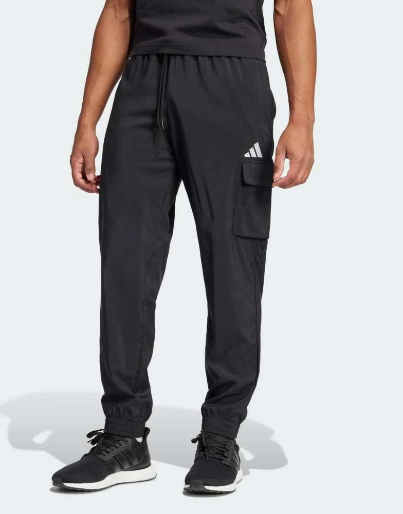 Adidas adidas Essentials small logo cargo pants in black / white 1