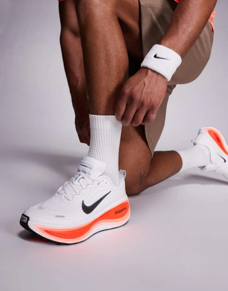 NIKE Nike Running Vomero Plus trainers in white and red 3