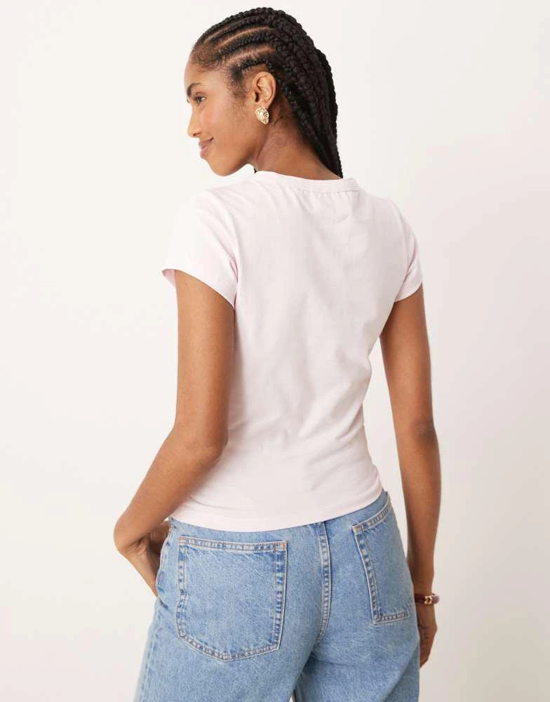 ASOS ASOS DESIGN baby tee with girl dinner graphic in pink 3