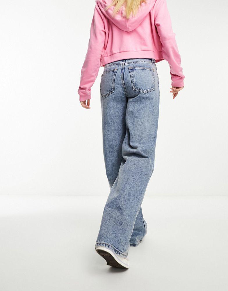Shop Monki Yoko high waist wide leg jeans in mid blue on
