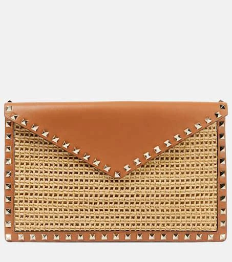 Valentino Rockstud Large leather-trimmed raffia clutch 1