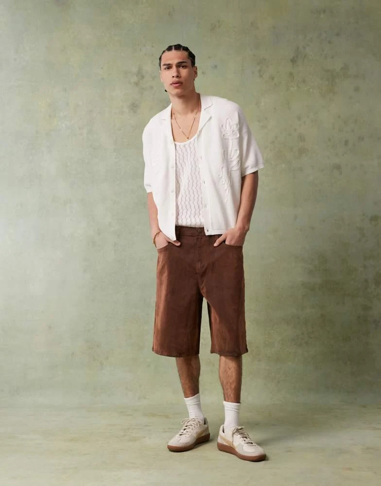 ASOS ASOS DESIGN relaxed boxy fit knitted button through polo with floral embroidery in ecru 3
