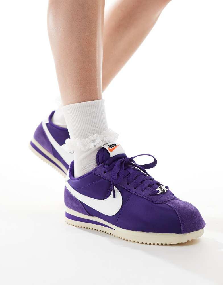 purple nike cortez