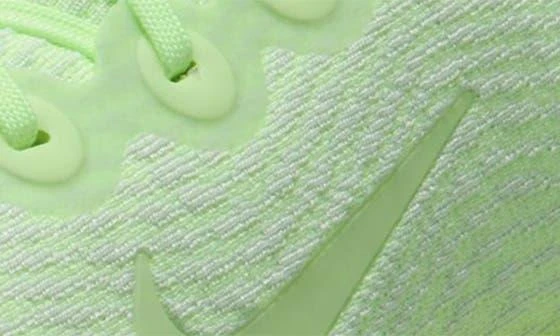 NIKE Motiva Walking Sneaker 9