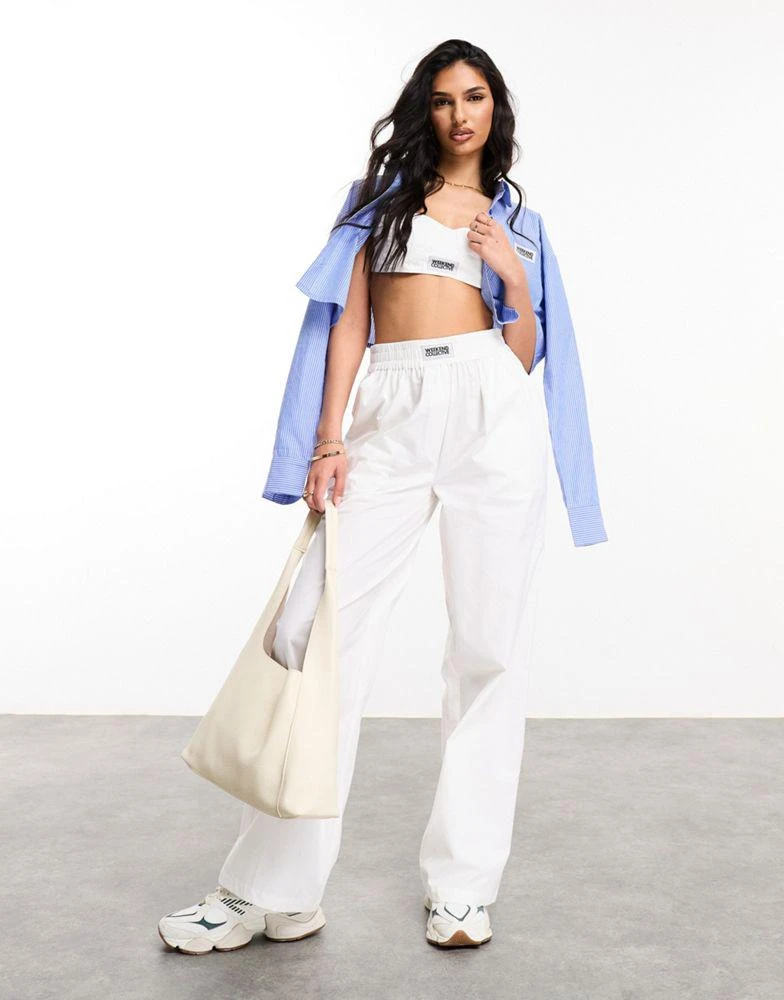 ASOS Weekend Collective Weekend Collective woven trousers with label in white 1