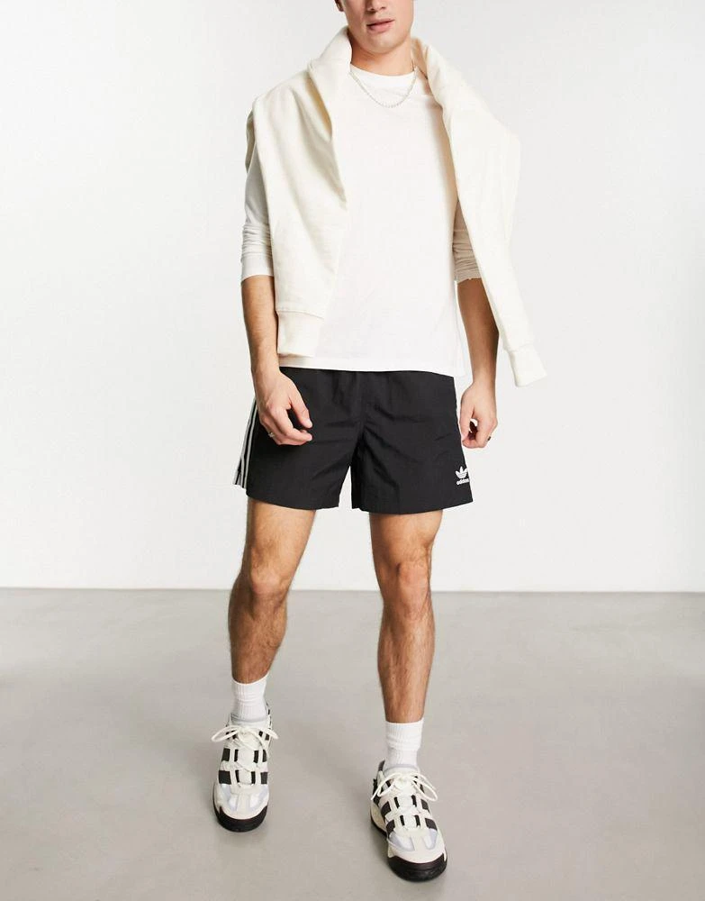Adidas adidas Originals 3 stripe sprinter shorts in black 4