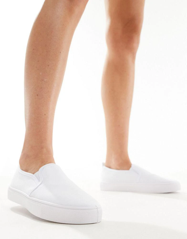 ASOS ASOS DESIGN Dotty slip on plimsolls in white 3