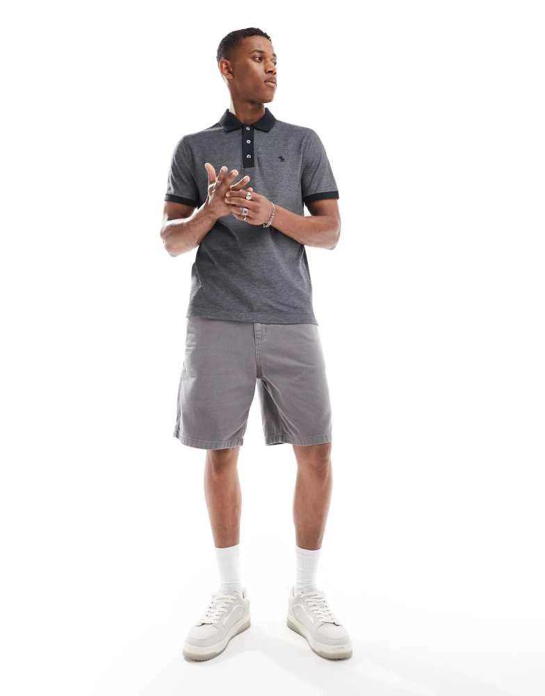 Abercrombie & Fitch Abercrombie & Fitch chic icon logo texture polo in black 2