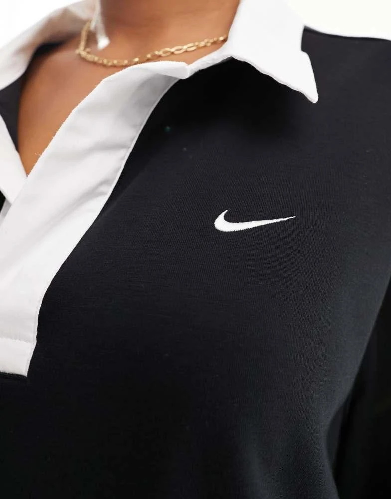 NIKE Nike Plus essential oversized long sleeve polo top in black 4