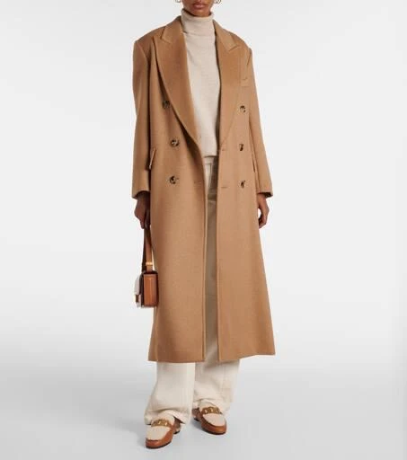 Tod's Catena shearling and leather mules 3