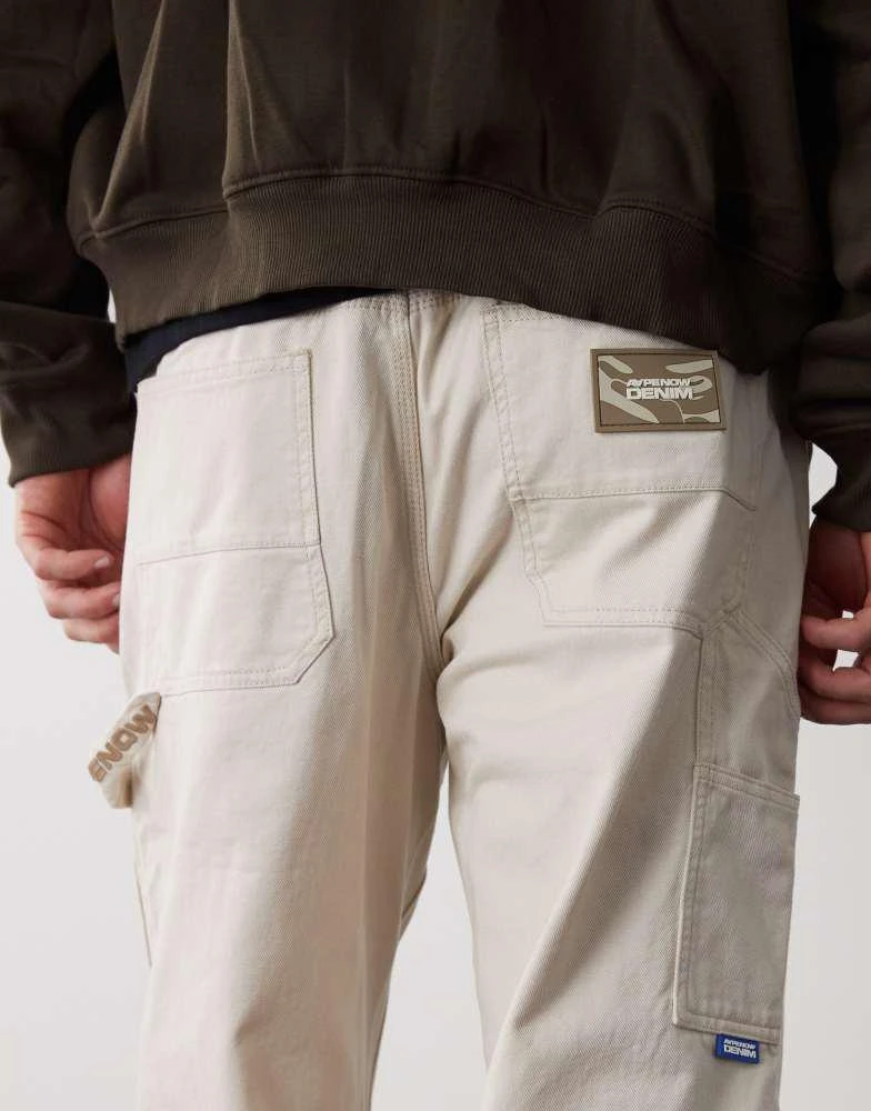 AAPE Aape by A Bathing Ape loose fit worker jeans in off white 5