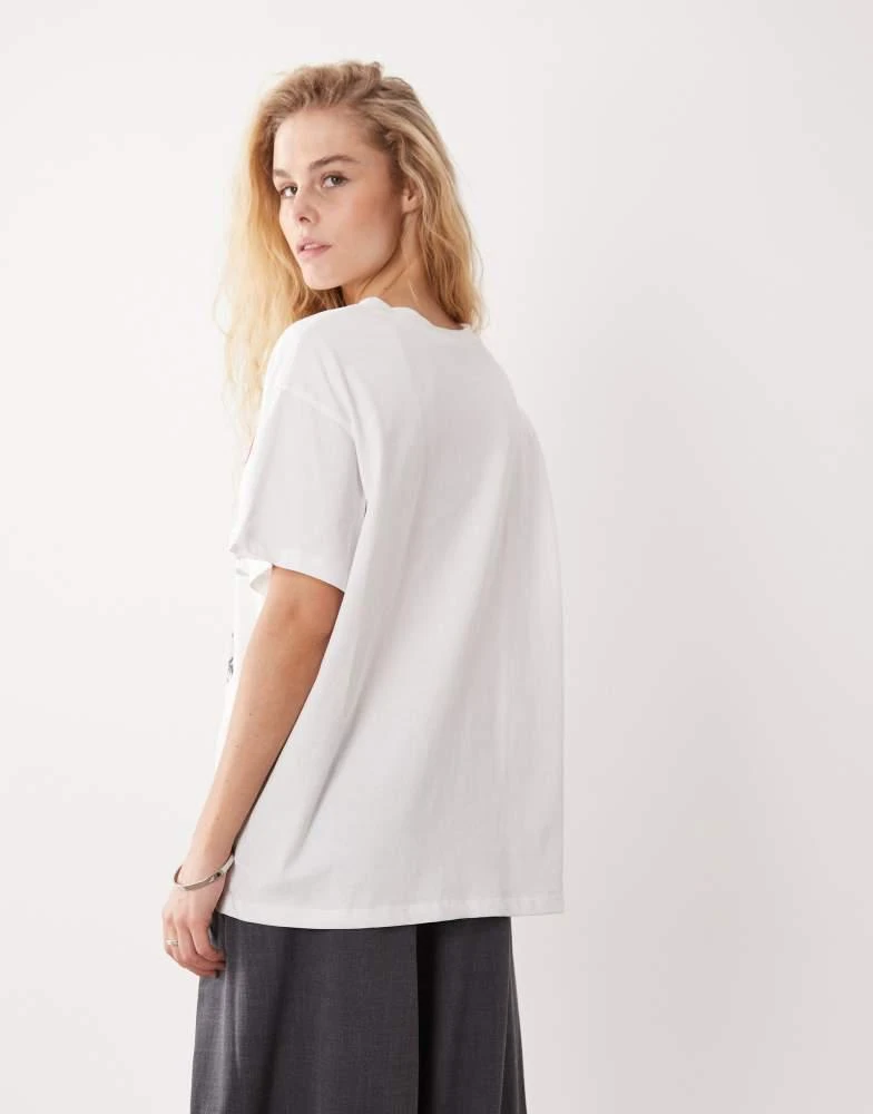 ASOS ASOS DESIGN short sleeve oversized top in white with New York print 4
