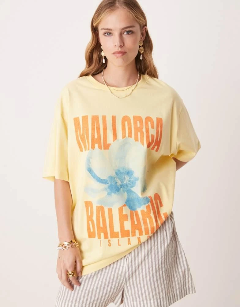 ASOS ASOS DESIGN oversized t-shirt with Mallorca graphic in yellow