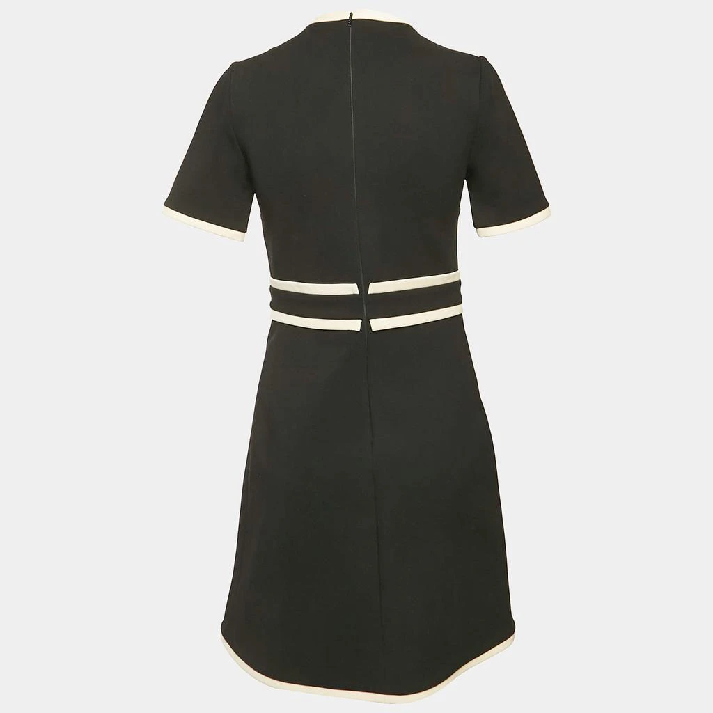 Shop Gucci Black Crepe Contrast Trimmed Tiger Button Detail Crepe Mini Dress  S on Sale at BeyondStyle  Get 22% Off Gucci Black Crepe Contrast Trimmed  Tiger Button Detail Crepe Mini Dress