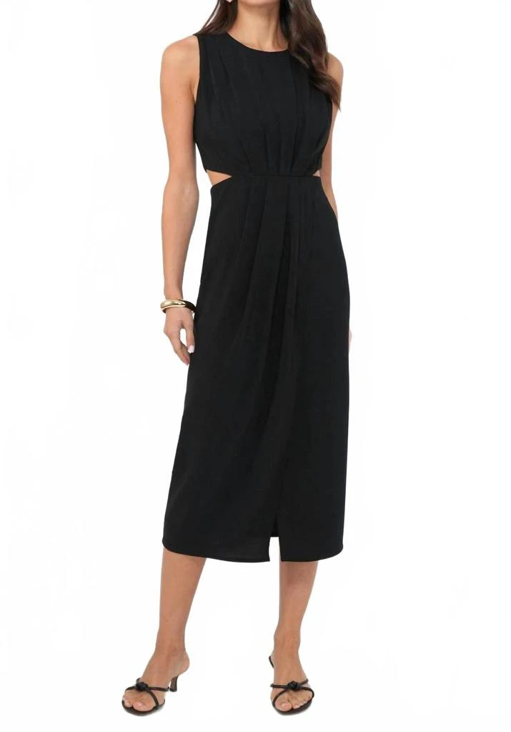 how is the dress blue and black Black Tape Black Cutout Knit Dress at Maria Vincent Boutique