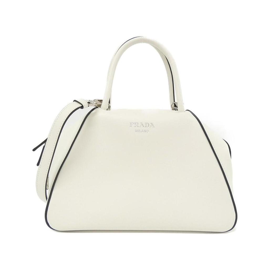 Prada PRINTED CALF HAIR CLUTCH - Handbags - BeyondStyle
