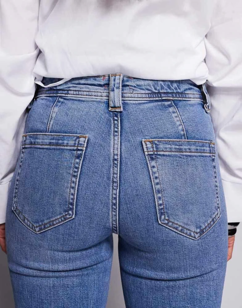 River Island River Island petite high rise pocket detail flare jeans in light denim 5