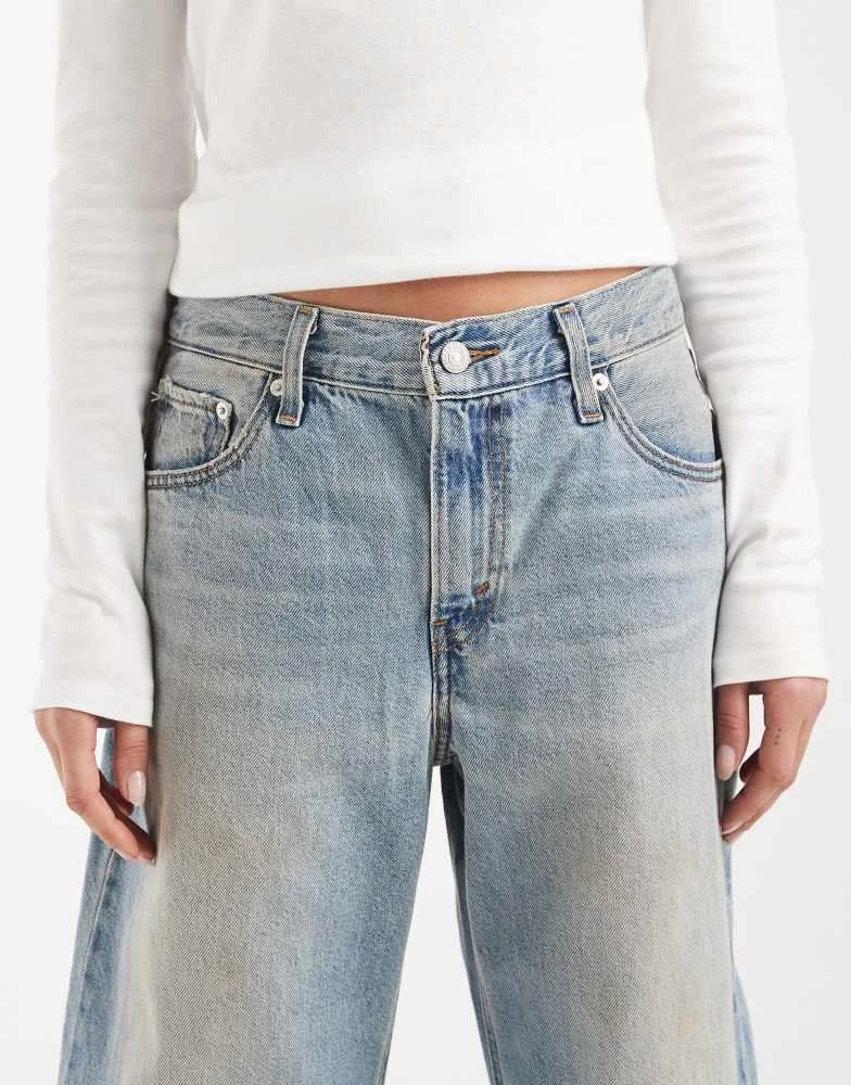 Levi
s Levi
s loose bootcut jeans in yellow tint mid blue 5