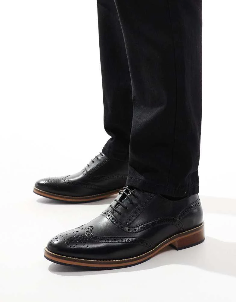 ASOS ASOS DESIGN brogue shoes in black leather with natural sole and colour details 1